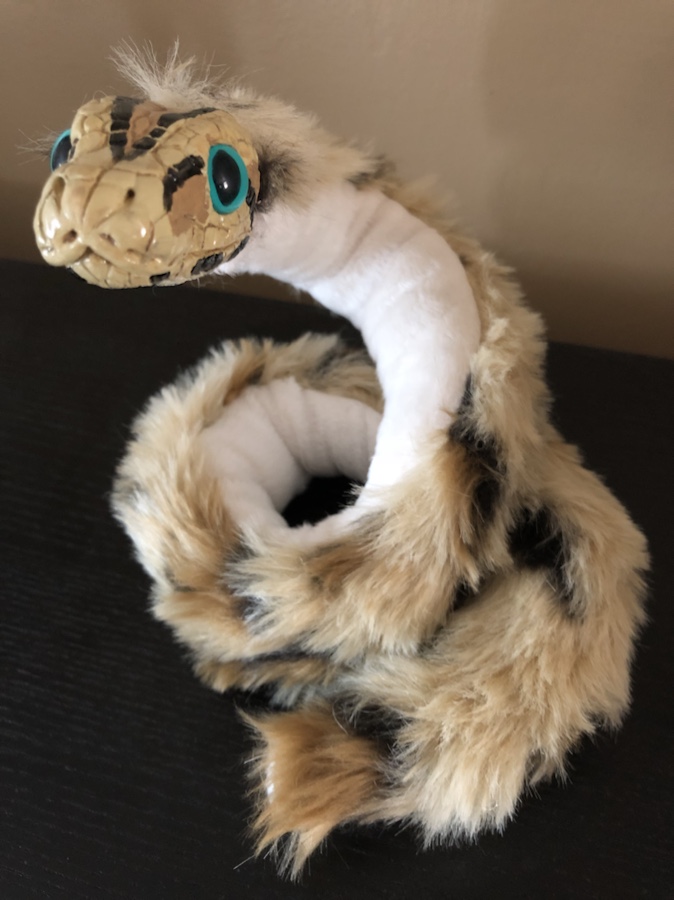 Furry shop snake toy